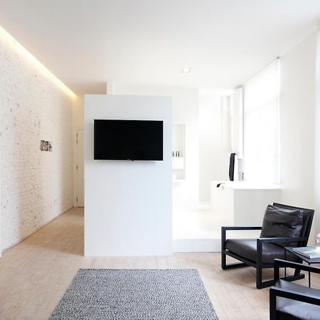 Maison Nationale City Flats & Suites Antwerpen Værelse billede A room at the hotel